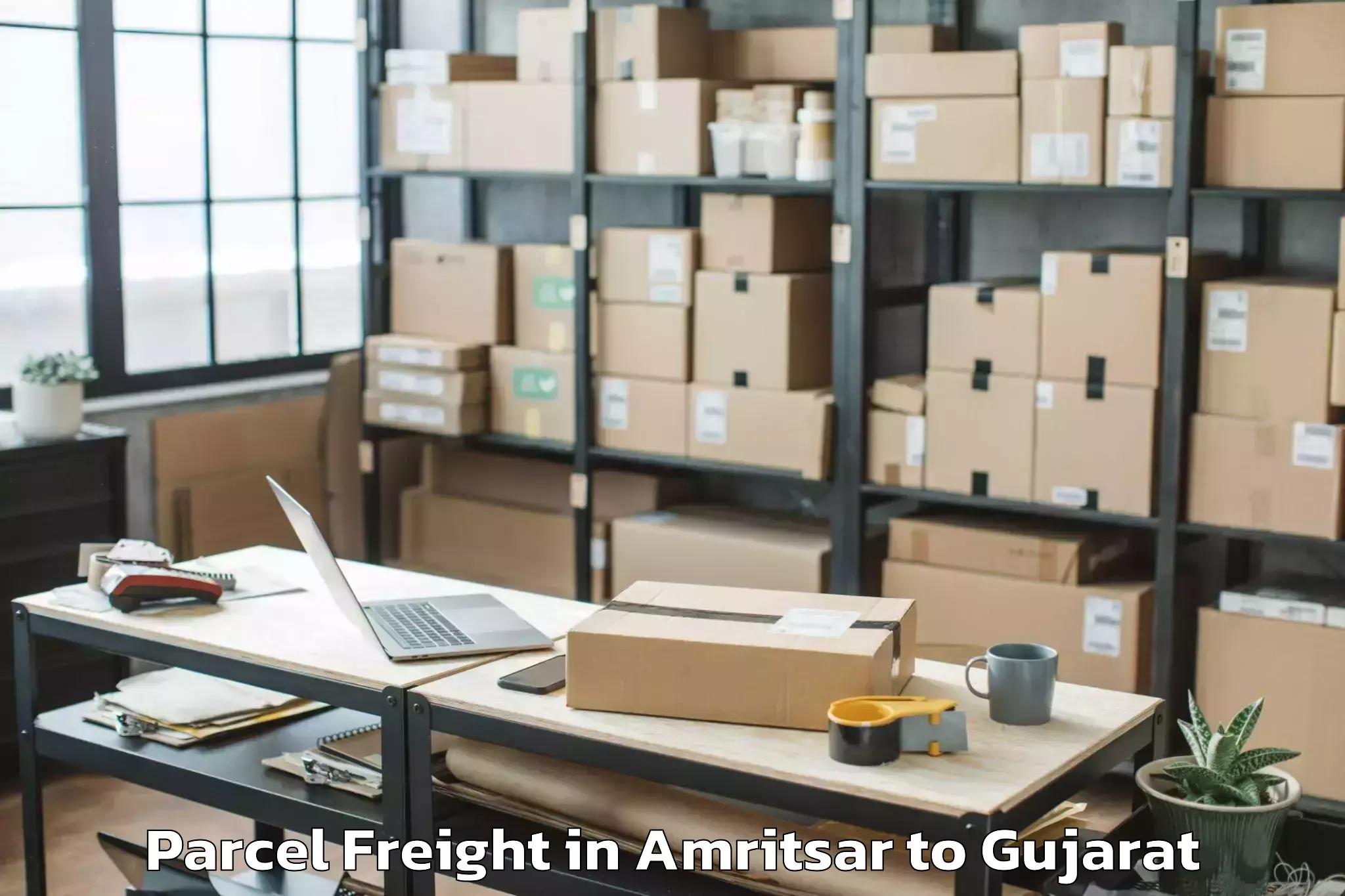 Reliable Amritsar to Jodiya Bandar Parcel Freight